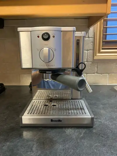 Like new Breville espresso machine. Sells for 250$ + tax=283$ at Canadian Tire ( see last pic). Pric...