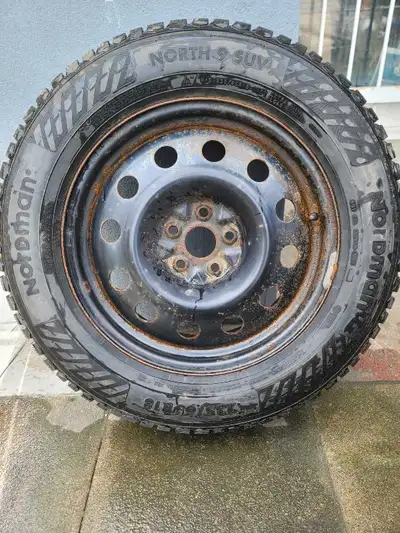 235/65R18 110T XL - Nordman North 9 Winter Tires with mags. Tire thread as shown in pictures almost...
