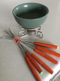 Ceramic fondue pot with votive and tools