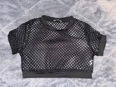 Black fishnet croptop Brand- SHEIN Size- M also fits like a small ( lightly worn with no stains or r...