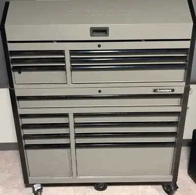 Newer Husky 58” upper and lower toolbox. Has power bar, wheels and locks. Comes with a Milwaukee 1/2...