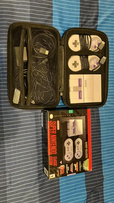 Like New 10/10 Condition Original box included Comes with all necessary wires and 2 original control...