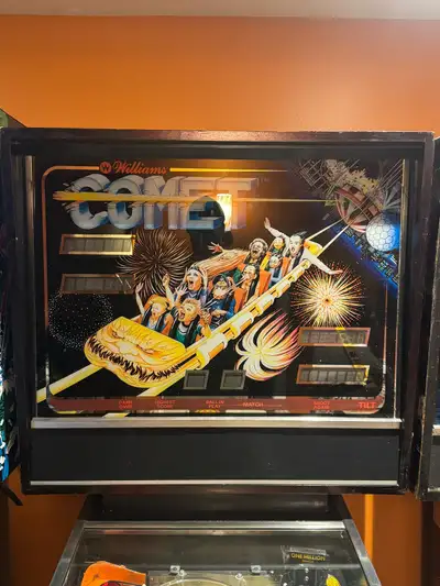 Experience the classic arcade thrills with this Williams Comet pinball machine, a vintage unit that...