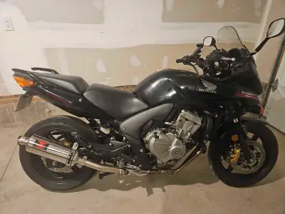 Looking for a reliable touring bike? This 2011 Honda CBF600 Tourer has been well cared for and is re...