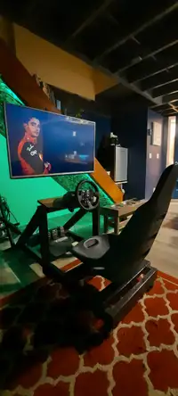 logitech g923 for xbox mounted to a race sim made from wood