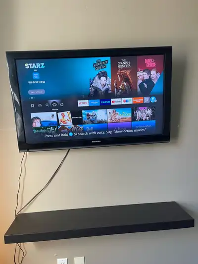 32 inch Toshiba Flat Screen TV + Floating Shelf – Moving Sale, View more