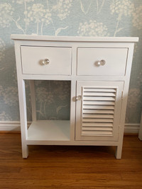 White wooden side table with glass knobs