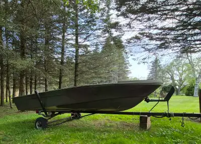 14 foot Jon boat with trailer and motor. Hunting blind will be included for free. Motor needs impell...