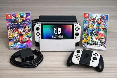 Nintendo Switch OLED + Mario Kart 8 Deluxe + Super Smash, View more