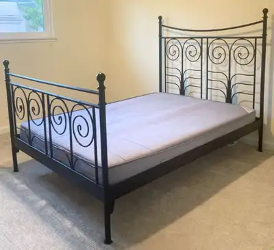 IKEA metal bed frame , double size , great condition , black , goes with every style. Wooden base (...