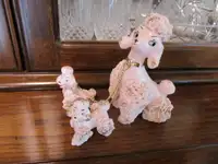 Vintage Pink Spaghetti poodle with puppies on chains ornament.
