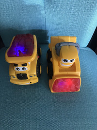 Two light up construction trucks (sounds) 