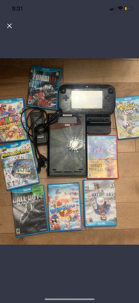 Wii u with bunch of games 