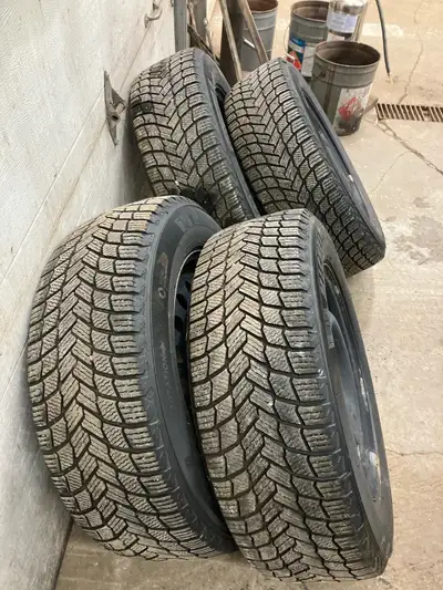 4 Michelin winter tires 90 percent tread 225/65r17 on 2016 Nissan rogue wheels $450 obo phone 506-63...