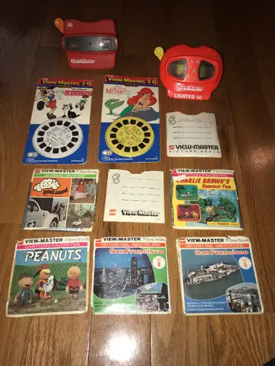 Big lot of View Master items....2 different view master viewers and 2 sets of sealed reels....The Li...