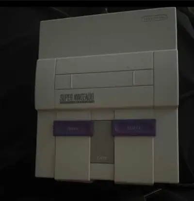 Get ready to relive the glory days of gaming with this classic Super Nintendo Entertainment System (...