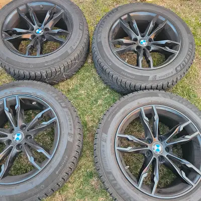 selling four 18 inch Michelin winter tires with black alloy and tpms sensors for $1300. 90% of tread...