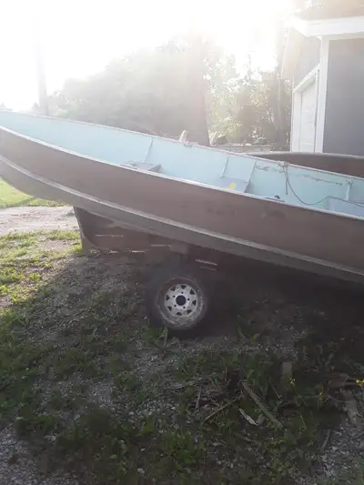 Older 14' Lund. (selling for someone else) Has small leak somewhere. In Atikokan $1,000 cash only.
