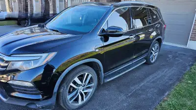 I am selling my 2017 Honda Pilot. As Is Reported 1 rear ending accident claim. Right rear side and f...