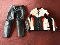 ALPINE STARS leather race jacket and DIANESE leather pants.