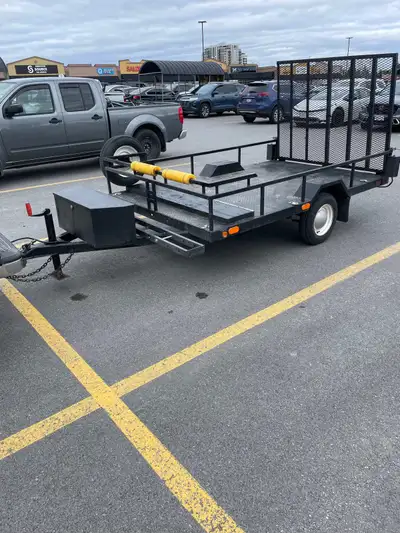 5 x 10 utility trailer can hold four dirt bikes or one quad and one dirtbike all lights work no rust...