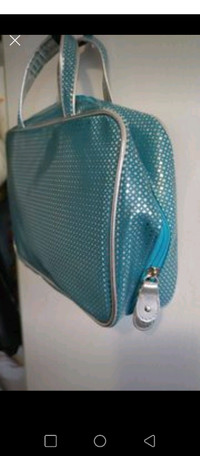Teal and silver travel bag, new $5 smoke free home 