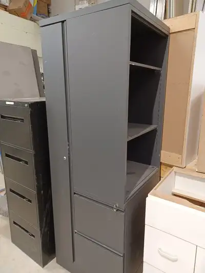 Metal Storage Tower This free standing tower features a wardrobe on one side , 2 drawers, and a book...