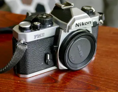 Manual focus 35mm F-mount SLR released by Nikon in 1982. It improved upon the original FM by adding...