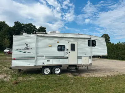 25 foot 5th wheel RV. Electric /Propane refrigerator working well. Propane water heater. Tires are i...