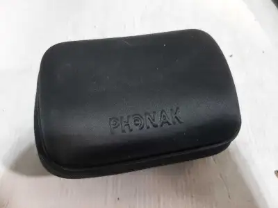 I'm selling a pair of used Phonak Audéo V hearing aids, complete with a ComPilot II device, charging...