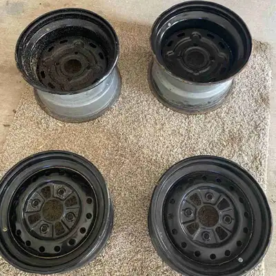 2 front 2 rear 4-bolt 12inch steel rims Some rust here and there Good for spare set or mud tires Ori...