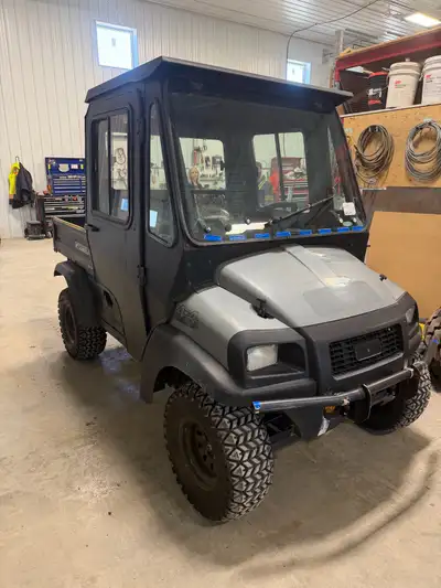 2020 Carryall 1500 HD, Kubota diesel Full enclosed cab with heat Dump box 1800 hours Good shape
