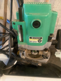Hitachi wood router.  3 hp with new but