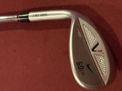For sale is a Nike V Rev Dual Sole Wedge, perfect for golfers looking to improve their short game. T...