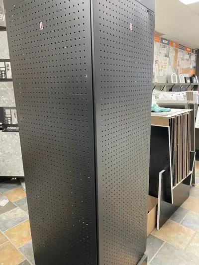 Four sided display stand on a swivel base. Have all the hooks for hanging things on. Each side measu...