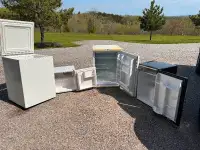 1 box freezer and 3 small bar fridges. Clean, used, working well