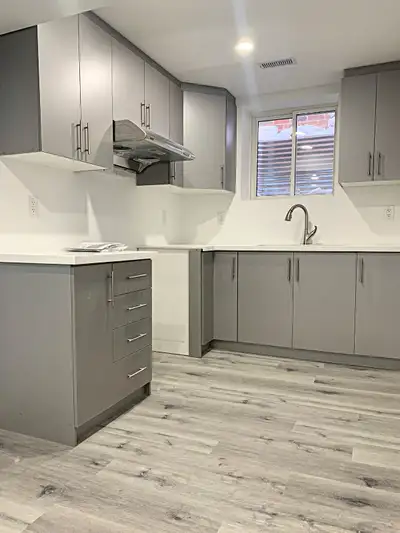 Be the FIRST to live here! Bright large windows, modern finishes, quartz kitchen, ample cabinets, el...