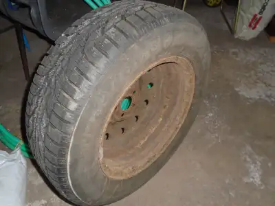 Four Firestone mud and snow winter tires.On rims. 215/65R16 Excellent condition.