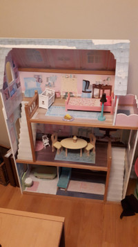 Barbie dolls, with doll house, camper, car and  Barbi clothing!!