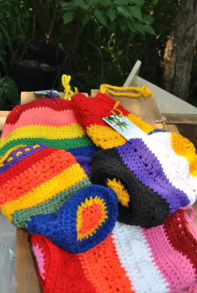 Hand made bags for carrying your small summer items like sunscreen, hair brush, etc. Made in bright...