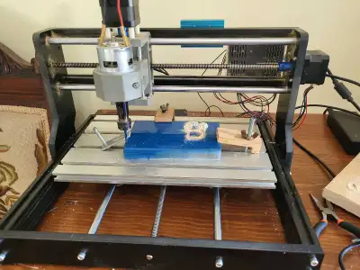 CNC and Lazer Printer. I'm told its all there for both applications. I have only used the CNC for a...