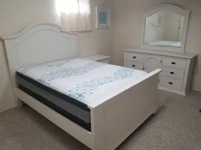 Double/full bedroom set with large dresser plus mirror and 1 night stand. Mattress included! In grea...
