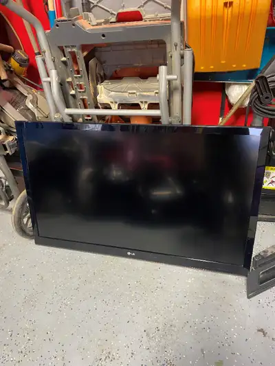 LG 46 inch TV complete with wall mount. No remote