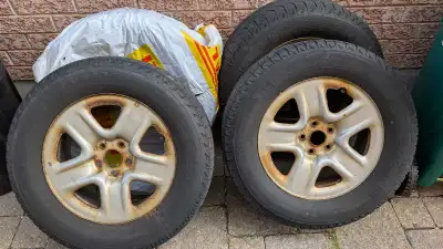 Set of 4 winter tires with rims, with good tread left, one tire low on air and need repair Were inst...
