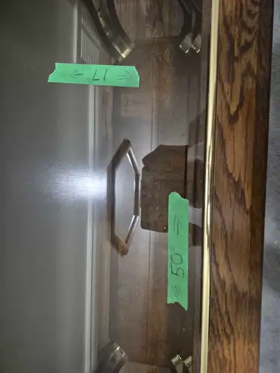 Console table, measuring 50 inches long and 17 inches wide. This table is sturdy, glass top is inser...