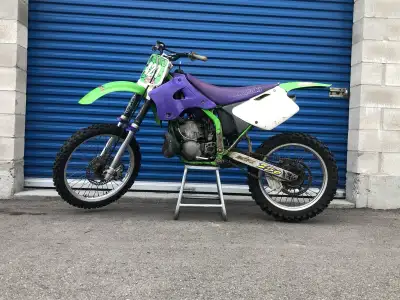 For sale are both my 1996 Kawasaki kx 250 2 strokes. Black & green plastic bike runs, has V Force re...