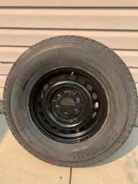 245/75R16 Tire and rim.