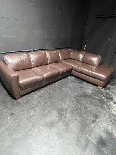 Natuzzi Editions Leather Sectional Timeless comfort meets quality craftsmanship with this Natuzzi Ed...