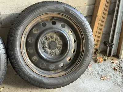 HANKOOK I*CEPT EVO winter snow tires on steel rims. 215 55 17 98V. Used on 2014 Nissan Juke. Older,...