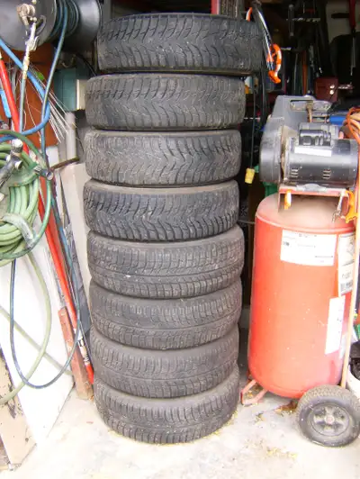 8 wheels balanced with tires and METAL REEMS. 4 holes rims, 185 R 15, 4 snow tires and 4 regular, in...